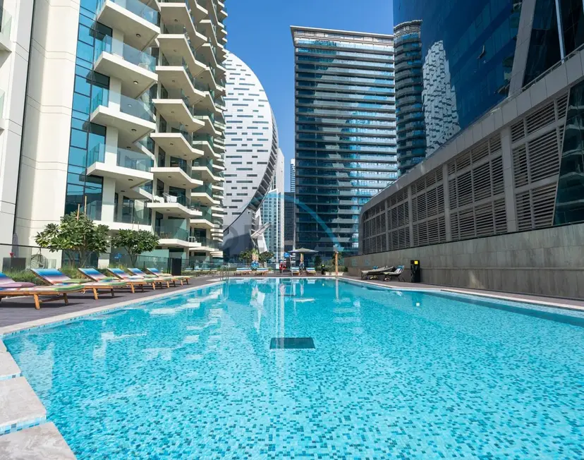 Contemporary 1-Bedroom w/ Partial Canal Views — Business Bay — photo 34