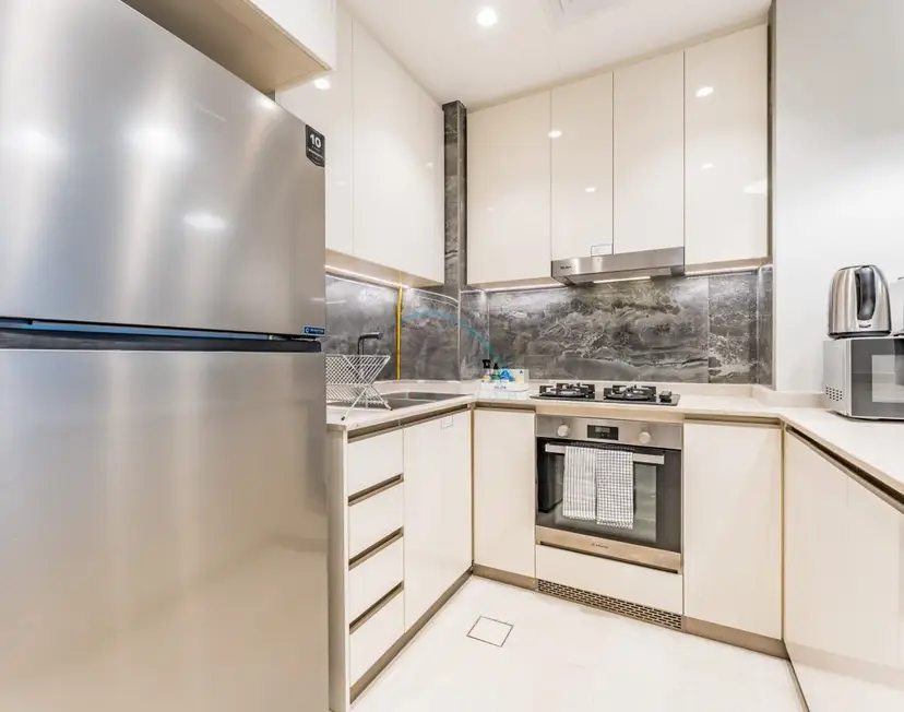 Spacious High-Floor 2-Bedroom with Stunning City and Burj Khalifa Views — Business Bay — photo 8