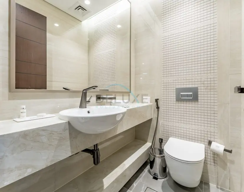 High-Floor 2-Bedroom with Vibrant Street Views and Effortless Drive — Business Bay — photo 9