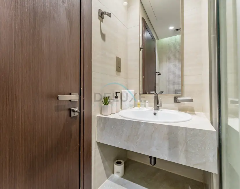 High-Floor 2-Bedroom with Vibrant Street Views and Effortless Drive — Business Bay — photo 20
