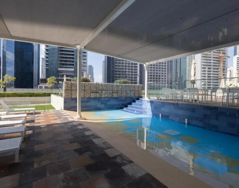 Contemporary 1-Bedroom Boho Oasis with Canal Views — Business Bay — photo 32